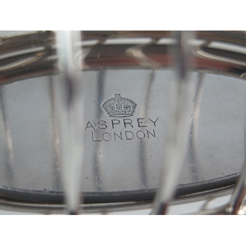 718 - A George V silver six division toast rack and warmer, maker Asprey & Co Ltd, Birmingham, 1913, of ov... 