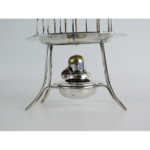 718 - A George V silver six division toast rack and warmer, maker Asprey & Co Ltd, Birmingham, 1913, of ov... 