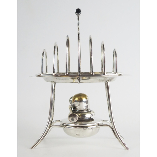 718 - A George V silver six division toast rack and warmer, maker Asprey & Co Ltd, Birmingham, 1913, of ov... 