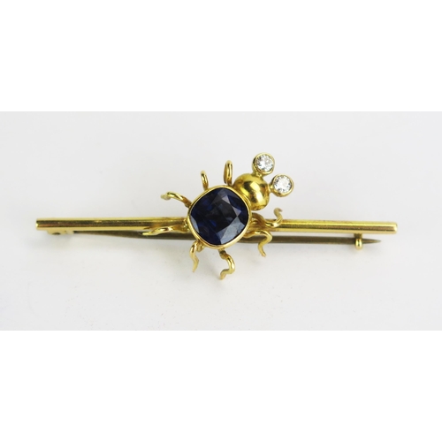 74 - A Diamond and Blue Stone Bug Brooch in a indistinctly marked precious yellow metal setting, KEE test... 