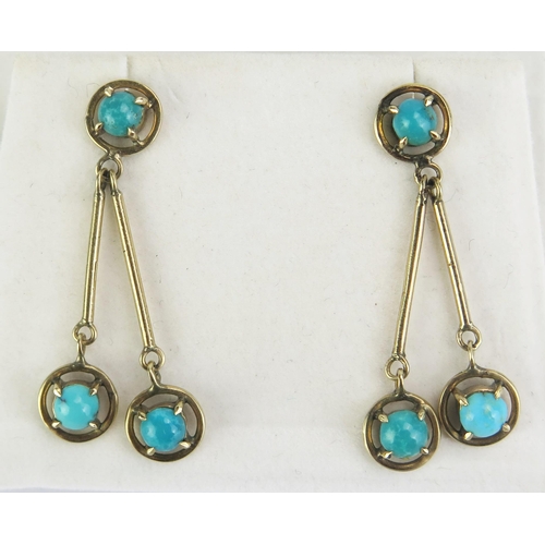 90 - A Pair of 9ct Gold and Turquoise Pendant Earrings, stamped mark to the butterfly, 36mm drop, 4.11g g... 