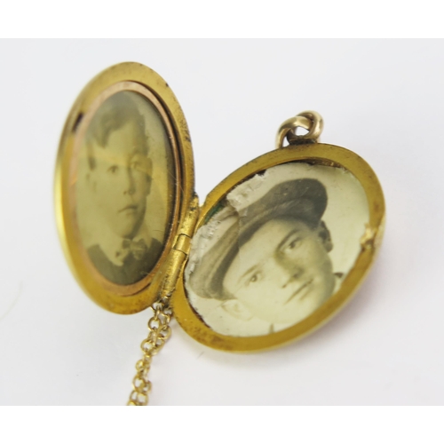 95 - A Precious Yellow Metal Locket with inset diamond (21mm diam. KEE tested as 9ct) and on a 9ct gold c... 