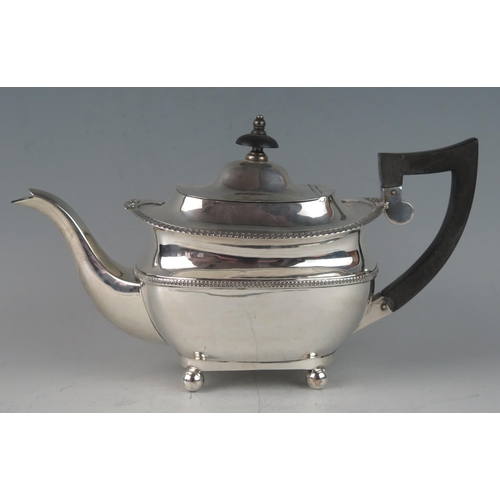 501 - A George V silver teapot, maker George Nathan& Ridley Hayes, Chester, 1912, of barge-shaped outline ... 