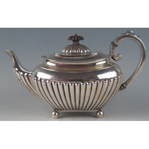 502 - A late Victorian silver teapot, maker James Dixon & Sons, Sheffield, 1894, of barge-shaped outline w... 