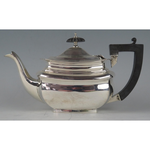 511 - An Edward VII silver bachelors teapot, maker William Aitken, Birmingham, 1907, of barge-shaped outli... 