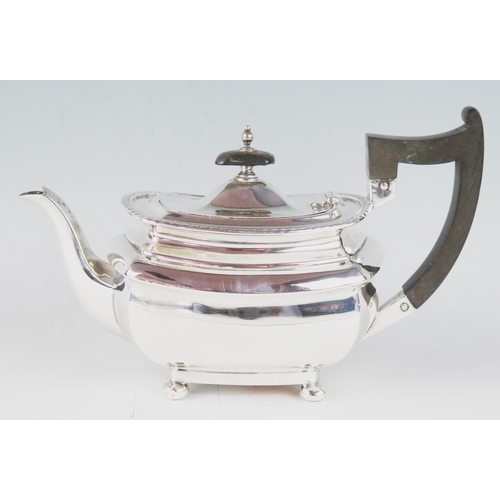 512 - An Edward VII silver barge-shaped bachelors teapot, make Walker & Hall, Sheffield, 1909, with gadroo... 