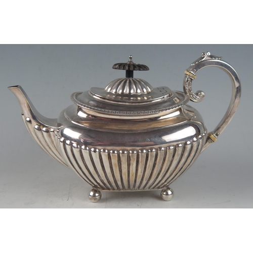 526 - A Victorian silver barge-shaped teapot, maker James Dixon & Sons Ltd, with gadrooned border, and hal... 