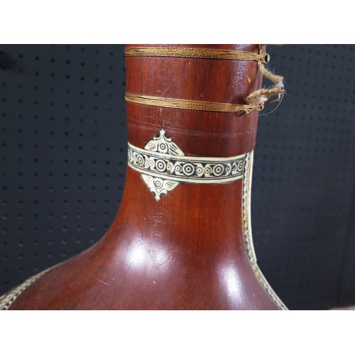 1318 - An Indian Sitar beautifully decorated with bone inlay and carvings - missing two tuning pegs