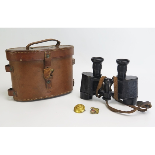 1362 - Ross, London, a pair of military issue case No 3 prismatic Binoculars, contained in stitched leather... 