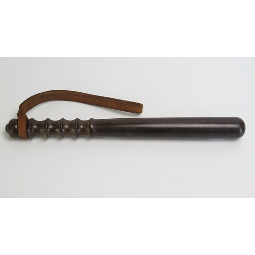 1365 - A hardwood truncheon, with ring turned handle, with leather  strap, 38cm long.