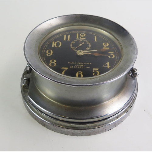 1383A - A Seth- Thomas WW2 AMERICAN U.S. NAVY DECK CLOCK NO. 1 the steel drum-shaped case with screw off bez... 