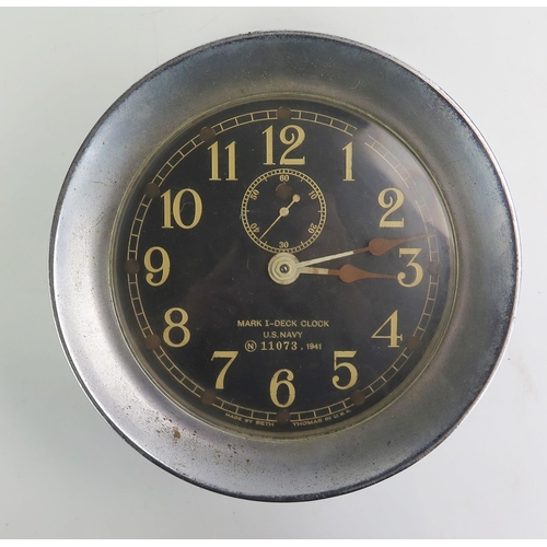 1383A - A Seth- Thomas WW2 AMERICAN U.S. NAVY DECK CLOCK NO. 1 the steel drum-shaped case with screw off bez... 