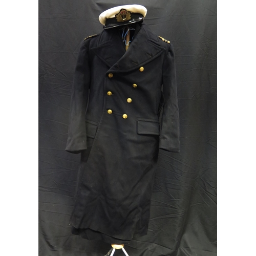 1392A - A Royal Naval Reserve commanders jacket, hat and long coat, together with a pencil sketch of the own... 