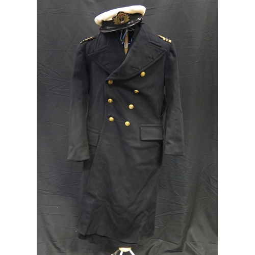 1392A - A Royal Naval Reserve commanders jacket, hat and long coat, together with a pencil sketch of the own... 