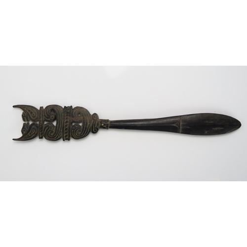 1668 - A Massim lime spatula, Trobriand Islands, Papua New Guinea, the handle surmounted with stylised bird... 