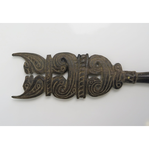 1668 - A Massim lime spatula, Trobriand Islands, Papua New Guinea, the handle surmounted with stylised bird... 