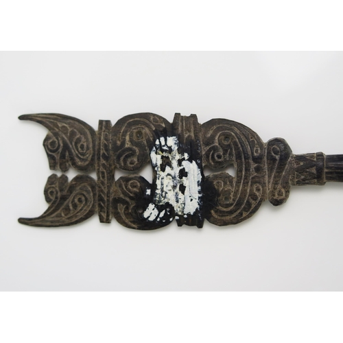 1668 - A Massim lime spatula, Trobriand Islands, Papua New Guinea, the handle surmounted with stylised bird... 