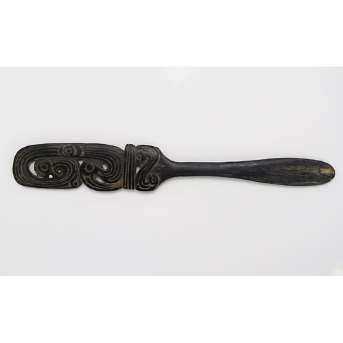 1669 - A Massim lime spatula, Trobriand Islands, Papua New Guinea, the blade17.5cm long.30 with pierced bir... 