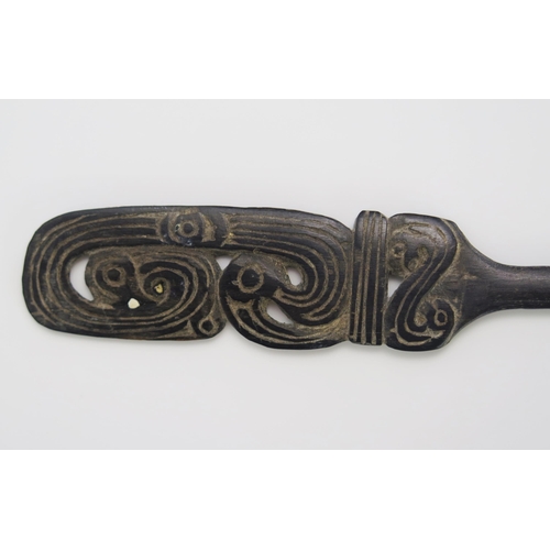 1669 - A Massim lime spatula, Trobriand Islands, Papua New Guinea, the blade17.5cm long.30 with pierced bir... 