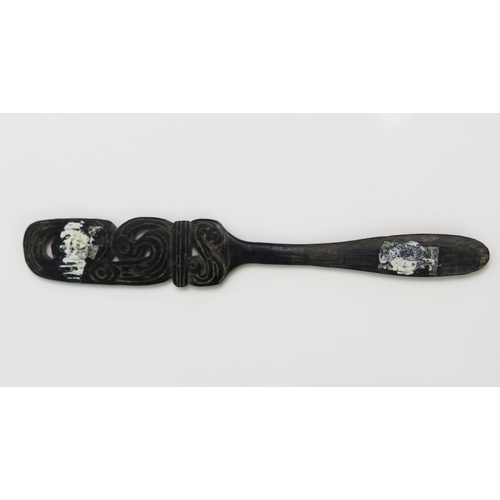 1669 - A Massim lime spatula, Trobriand Islands, Papua New Guinea, the blade17.5cm long.30 with pierced bir... 