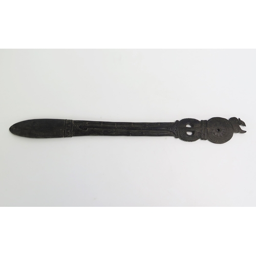 1673 - A Massim lime spatula, Trobriand Islands, Papua New Guinea, the handle surmounted with a bird and pi... 