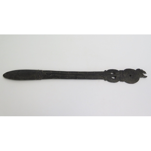 1673 - A Massim lime spatula, Trobriand Islands, Papua New Guinea, the handle surmounted with a bird and pi... 