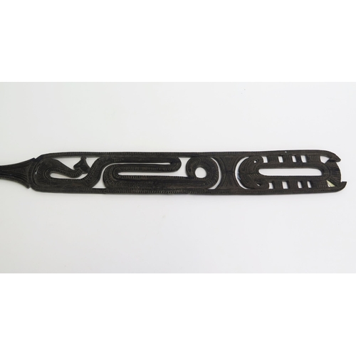 1674 - A Massim lime spatula, Trobriand Islands, Papua New Guinea, the handle with pierced geometric and co... 