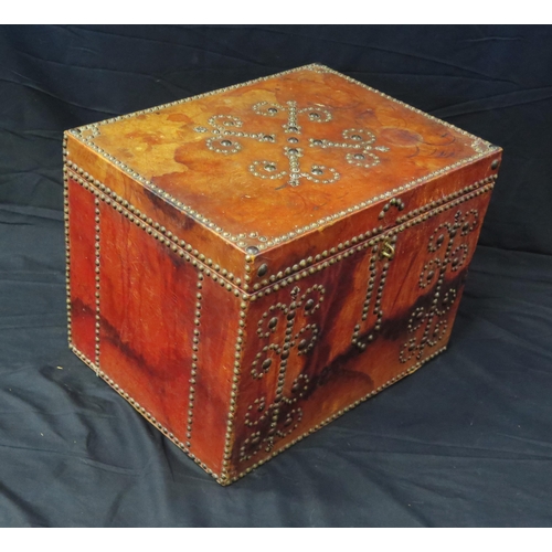 1680 - A red leather bound trunk, with metal stud decoration, having a hinged rectangular top, 51cm wide.