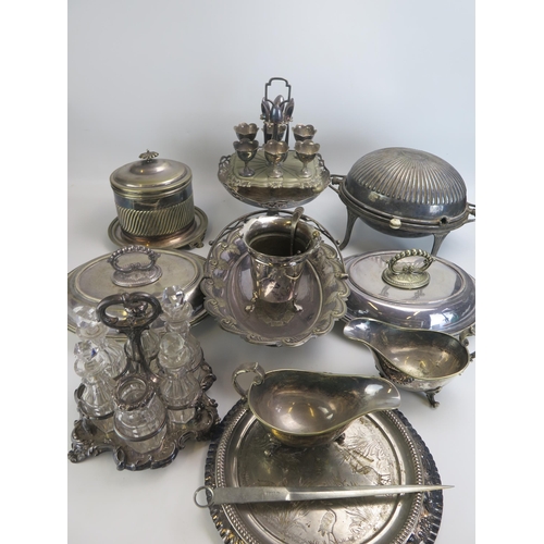 756 - A quantity of assorted plated wares including entree dishes and covers, condiment stand, biscuit bar... 