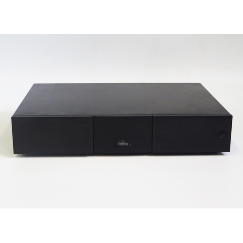 1320C - Naim CD 555 PS (CD Player Power Supply) (Serial No. 282189) sold with Naim power lead and CD player ... 