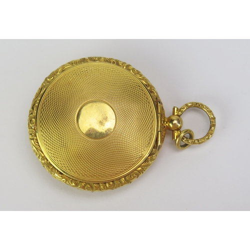 106 - A Large 19th Century Precious Yellow Metal Double Sided Locket with engine turned decoration, 40.9mm... 