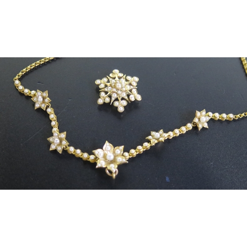 113 - A Victorian 15ct Gold and untested Pearl Necklace with detachable brooch back suspension on an integ... 