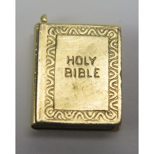 127 - A 9ct Gold Bible Charm, hallmarked, 1.48g