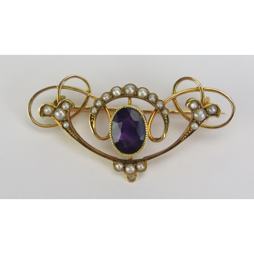 129 - A 15ct Gold, Amethyst and Pearl Brooch, 37.5mm wide, stamped 15CT, 4.3g