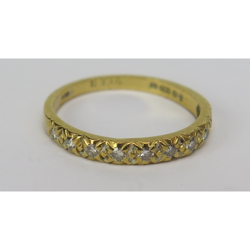 139 - An 18ct Gold and Diamond Half Eternity Ring, size M.5, London hallmarks, 2.08g