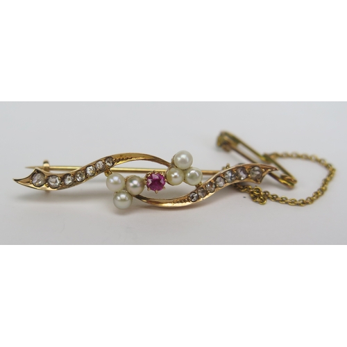 141 - A 15ct Gold, Old Cut Diamond, Ruby and untested Pearl Brooch, 41.6mm, stamped 15, 4.25g