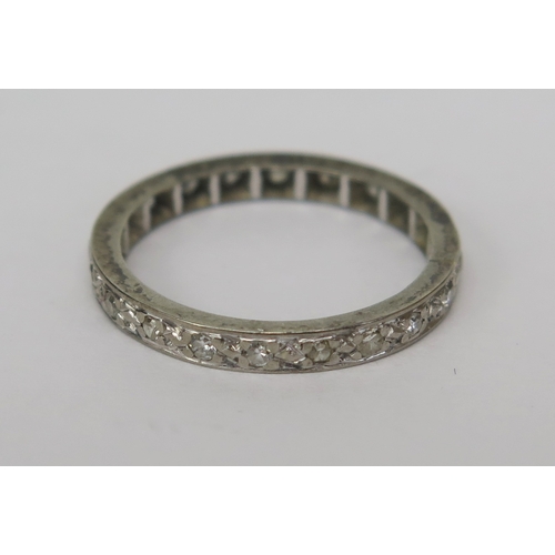 142 - A Diamond Eternity Ring in a precious white metal setting, 2.27mm wide band, size I, 1.78g