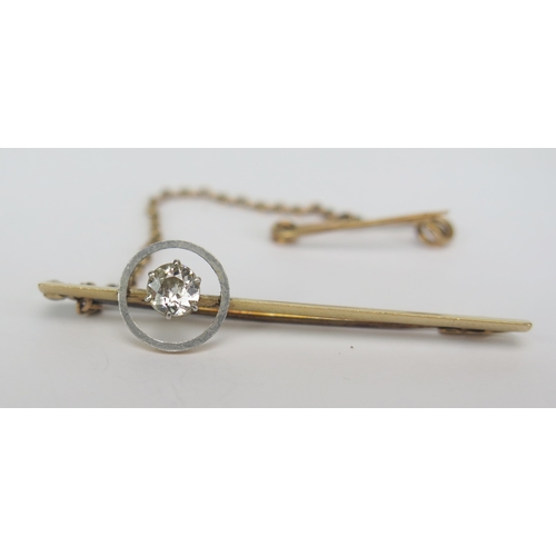 149 - A 15ct Gold, Platinum and Old Cut Diamond Halo Brooch, 44.8mm, 4.6mm stone, stamped marks, 2.91g