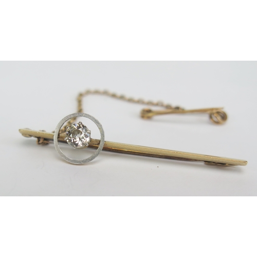 149 - A 15ct Gold, Platinum and Old Cut Diamond Halo Brooch, 44.8mm, 4.6mm stone, stamped marks, 2.91g