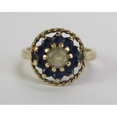 17 - A 9ct Gold and Blue and White Spinel Cluster Ring, 14.1mm diameter head, Birmingham hallmarks, size ... 