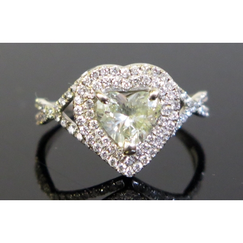 180 - A Modern Heart Shaped Diamond Ring in a precious white metal setting, central stone c. 1.5ct, 13x12.... 