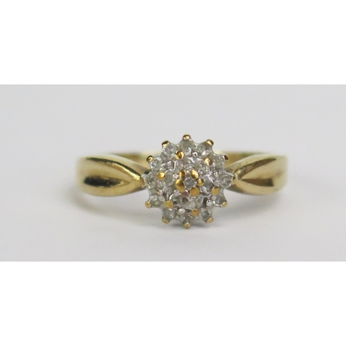 188 - A 9ct Gold and Diamond Cluster Ring, 8mm wide head, size M.5, hallmarked, 2.35g