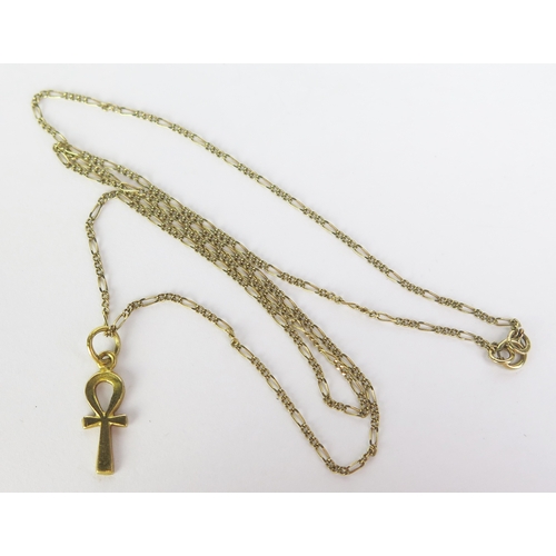 191 - An Egyptian 12ct Gold Ankh Pendant (.93g) on a 9ct gold figaro chain, 18