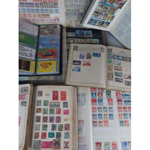 385 - A Large Collection of World Stamps arranged in albums and stock books including a large quantity of ... 