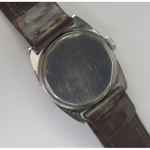 405 - A 1930's J.W. Benson Steel Cased Wristwatch, 29mm case with enamel dial. Winds and runs