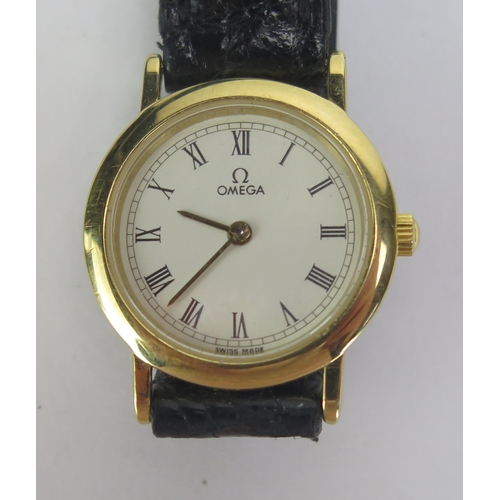 407 - A Modern Ladies Omega De Ville Gold Plated Wristwatch, 22mm case, quartz movement. Untested, needing... 