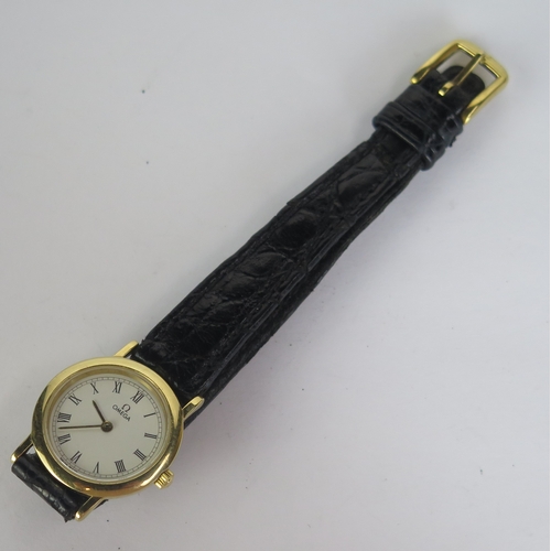 407 - A Modern Ladies Omega De Ville Gold Plated Wristwatch, 22mm case, quartz movement. Untested, needing... 