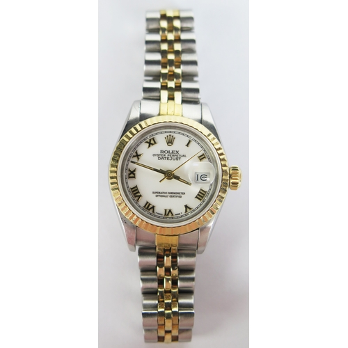A Ladies ROLEX Steel and Gold Datejust, ref: 69173,  26mm Oyster case, no. E161650, back no. 69000A, caliber 2135 25 jewel automatic movement no. 276142, steel and gold bracelet. Boxed and running
