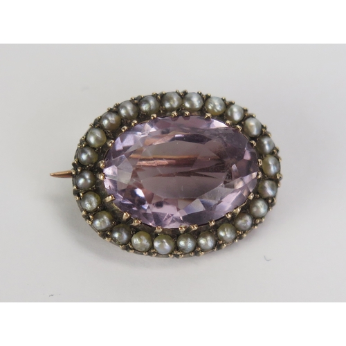 5 - An Amethyst and untested Pearl Brooch in a precious yellow metal setting, 21.5x17mm, KEE tested as 9... 