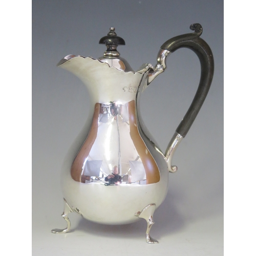 509 - An Edward VII silver hot water jug, maker William Hutton & Sons Ltd, London, 1906, of baluster form ... 